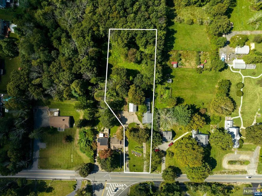 Great Opportunity To Purchase Over 2.5 Acres and Build Your Dream Home Today! Current Home Needs Total Rehab/Demo. 2 Car Detached Garage, and Large Driveway! Newer 3 BR Septic. By Appointment Only! Value Is In The Land! Bring Your Investors!