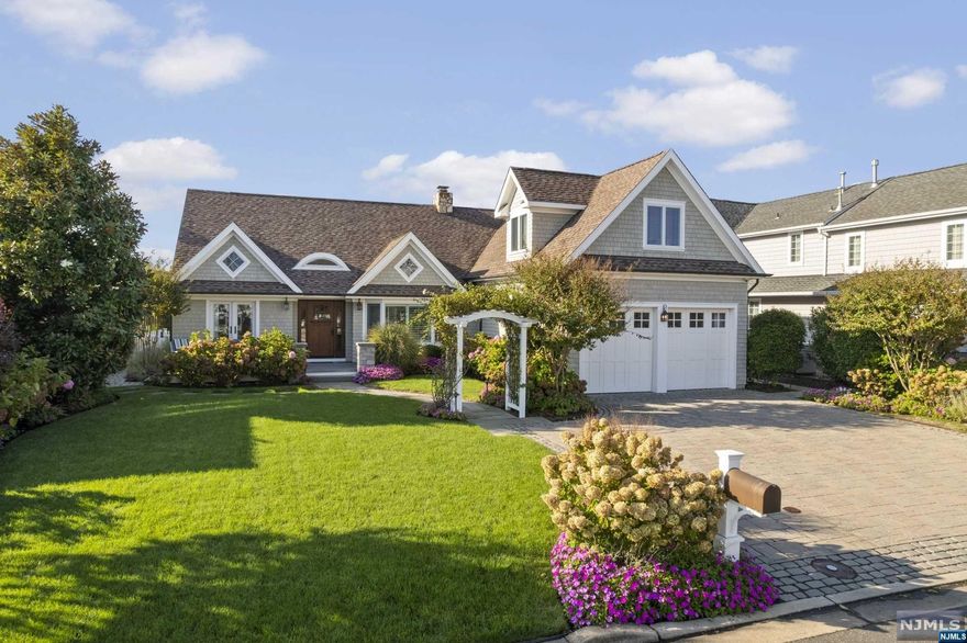 Welcome to Squan Beach Dr. in exclusive Curtis Point. This 4 bed 3/1 bathroom home was meticulously renovated in 2016. The multi-level well-appointed backyard includes Ipe decking, heated saltwater gunite pool, BBQ island with Lynx grill, gas firepit, waverunner / boat lifts, sound system and luscious landscaping w/ decorative lighting. Inside the gourmet kitchen Subzero, Meile and Wolf appliances are surrounded by custom cabinetry and stone countertops. The kitchen flows into a spacious living / dining room w/ wood fireplace. A first-floor primary suite, half bath and laundry room complete this level. Upstairs includes 3 bedrooms, two full bathrooms and a terrace overlooking the lagoon. Reclaimed hardwood floors, built-ins and natural sunlight make this home warm and elegant. Curtis Point amenities include private beach access, tennis and bocce courts.