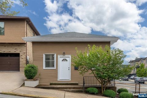 Photo of 418 E Brinkerhoff Avenue, Palisades Park, NJ 07650 (MLS # 26008904)