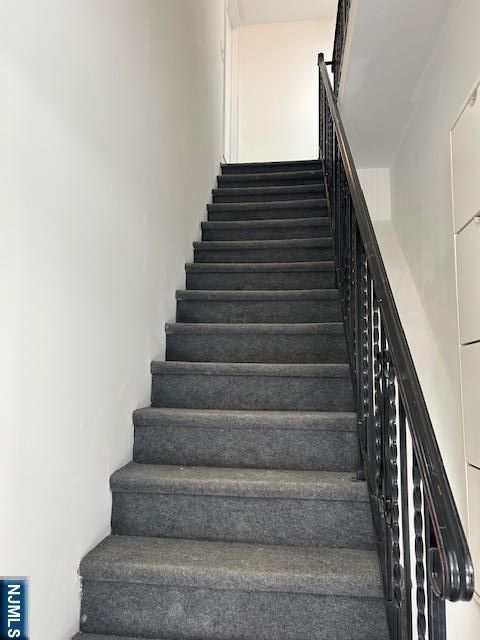 Photo of 67 Plum St, Paterson, NJ 07503 (MLS # 26006408)