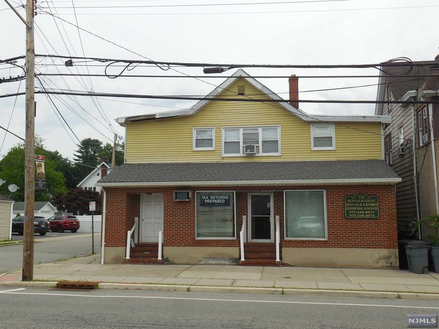 Great opportunity for owner occupied or investor!1 st floor is set up for an office/ Business with reception room, conference rm & 4 offices, storage rooms and 2 half baths, Back & Front entrances ,Front 2 nd floor apt Features- 2 Bedrooms, Eat in Kit & Living rm/ Dining rm combo, Full Bath, Private entrance. Back 2 nd floor apt has just been renovated ! Features New Carpeting , Freshly painted & new vanity in Bathroom - 2 Bedrooms, Eat in Kit& Living rm/ Dining rm combo, Covered porch Private entrance, Paved parking lot fits 6 + cars, Easy access to Public transportation !