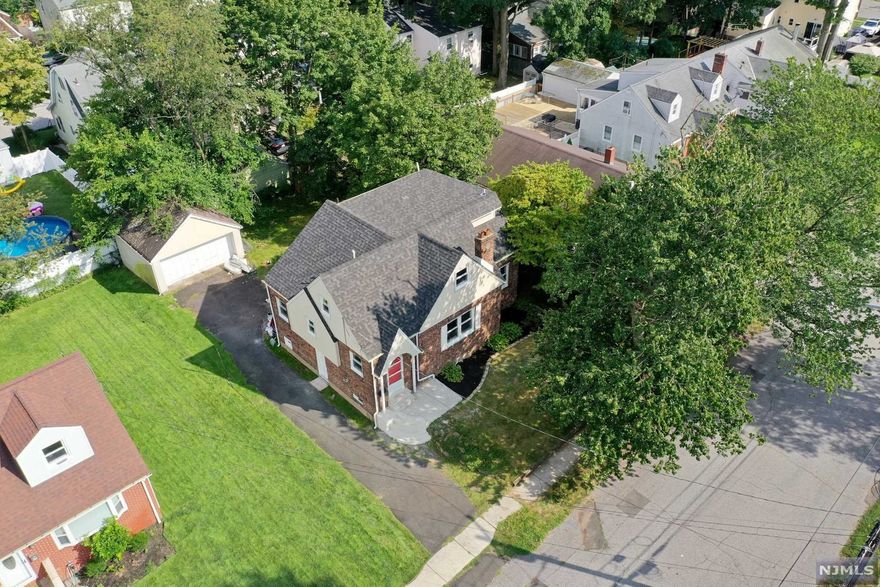 Fantastic opportunity to live in Bergenfield. Exceptional school district. This home has been beautifully renovated with five bedrooms, separate dining area, large full bathroom on main floor, large bedroom also on main level, huge kitchen, with all brand new stainless steel appliances, large finished basement, and with a large two car garage. Home has brand new central air, and heat, all new electrical, plumbing, HVAC, insulation, windows, working fireplace....complete home has everything brand new!