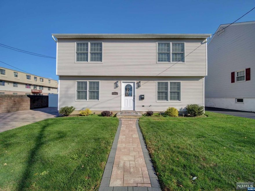 This single family home in Lyndhurst has it all; location, spacious living space, large backyard, tons of parking & more! Tastefully renovated in 2020, this home boasts hardwood floors throughout, living room with gas fireplace, open concept kitchen with large island, dining room & a full bath on the first level. On the second level, you have an extra-large primary bedroom with a huge walk-in closet, large spa-like full bath & 2 more bedrooms. Additionally, the home offers 2-zone central heating & air conditioning & an attic for storage. The backyard includes a covered paver patio & lawn space for summer entertaining & shed for additional storage & a vinyl fence for privacy. The property also has a paver driveway that can accommodate 4 cars & is conveniently located near Rt 21, NJTP, GSPW, Rt 17 & Rt 3. Public transportation options to NYC, including NJTransit trains, buses, DeCamp Bus lines are all minutes away & Newark Airport is within a 20-minute drive.