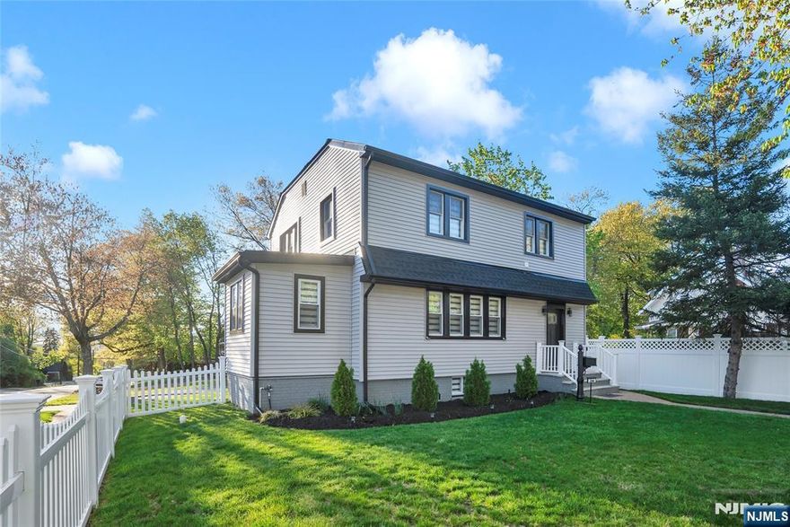 This stunning Teaneck home delivers the best of modern luxury living with beautiful hardwood floors throughout and a sun-filled open concept layout. The showstopper kitchen features top-of-the-line stainless steel appliances and a striking center island, perfect for everyday living and effortless entertaining. The first floor offers a convenient half bath, while the second level boasts three spacious bedrooms with generous closet space and two full bathrooms.The fully finished basement adds valuable bonus living space complete with its own full bath, ideal for guests, recreation, or a home office, with the possibility of being used as an in-law suite.Major upgrades include a brand-new roof, plumbing, electrical, and central air for true peace of mind. The property also features a smart sprinkler system in the lawn that connects to your phone for easy and convenient control.Perfectly situated on a quiet residential corner lot of over 7,000 sq. ft., this home blends luxury, comfort, and style in one exceptional package.Do not miss this incredible opportunity. Schedule your private showing today.