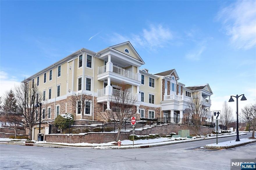 Enjoy upscale one floor living at the sought after Four Seasons at Ridgemont 55 plus community. This 2 bedroom, 2 bath unit offers 1,957 square feet of living space with many upgrades. Entry foyer invites you into the dining room with tray ceiling, open to living room with beautiful wood flooring throughout. Eat-in-kitchen with custom cabinetry, granite countertops, ss appliances and center island. Open concept from the kitchen to the family room with gas fireplace offers a fabulous entertainment flow w/breakfast area with sliders leading to a large private covered balcony. The primary bedroom suite has two walk-in closets, full bath with double vanities. Second bedroom, full bath and laundry room complete the living space. Garage parking with 2 parking spaces and 2 storage units. Enjoy resort-like amenities with Clubhouse for activities and social events throughout the year, exercise room, card room, outdoor pool, jacuzzi, bocci court and putting green. Close to major highways, restaurants, and shopping. One floor living at its best!