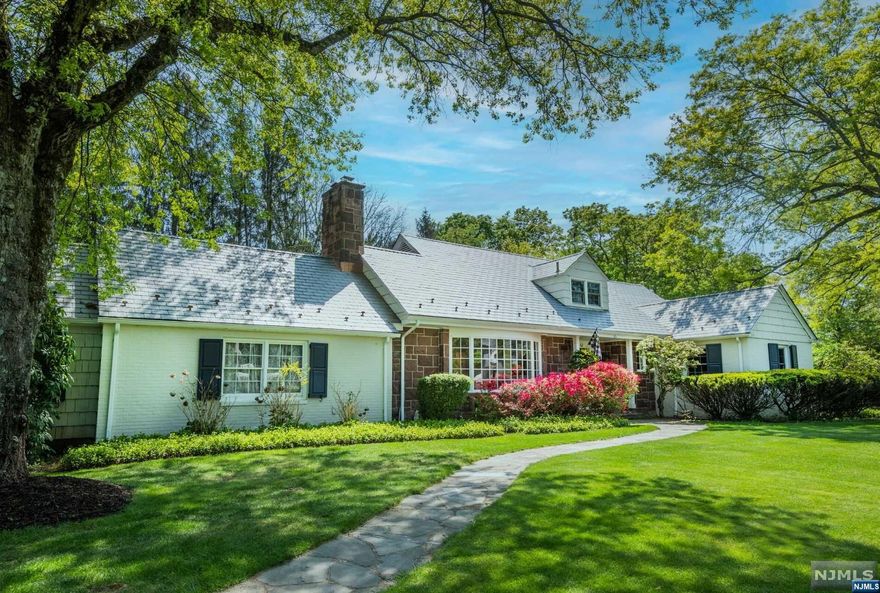 Welcome to this lovely home situated on a beautiful one acre lot located in highly sought-after Ho-Ho-Kus, surrounded by many multi million dollar homes. Many recent renovations throughout this 4/5 BR, 3 1/2 bath including 2018 addition w new roof,new kitchen,newly paved driveway & more! The first flr features a spacious living rm w wood burning fpl, bay window & hardwood flrs. Continue through to formal dining rm w/pocket french doors, opening to beautifully renovated kitchen w large center island & high end appliances. Adjacent breakfast rm with access to the meticulously landscaped, private and fenced-in yard. Sunken family rm w/fireplace, brick hearth & walls of windows. 1st fl primary BR w/ beautifully renovated bath and Addt'l BR w attached bath. New mud rm & rear powder rm. The second floor features 2 brs with a shared bathroom (SOT) & a bonus rm (possible 5th BR). Finished basement w/bar, rec room & laundry. Beautiful & private property! You do not want to miss this one!