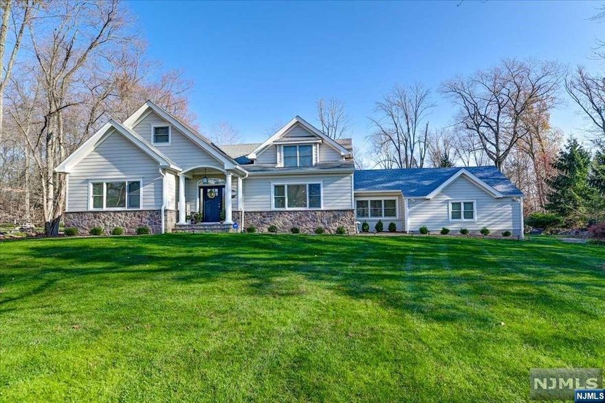 NEWLY UPDATED DREAM HOME SITUATED ON A PARK LIKE SETTING WITH OVER 5000 SQ FT ACROSS THREE LEVELS. UPON ENTRY YOU ARE GREETED BY A BRIGHT 2 STORY ENTRY FOYER W/CUSTM ILL WORK, STUNNING HW FLOORS & STAIRCASE. FABULOUS OPEN FLOOR PLAN W/LR W/FP, DR & OVERSIZED KITCHEN. KITCHEN OPENS TO A LARGE 3 SEASON RM. THE 1ST FL PRIMARY SUITE IS YOUR PRIVATE ESCAPE, W LUX BATH, 2 WIC & 2 ADDT CLOSETS. A POWDER RM, LNDRY RM, & BONUS RM/DEN FINISH OUT THE FIRST LEVEL. LEVEL 2 OFFERS BR W/EN SUITE, 3 ADDT LARGE BR'S,& HALL BATH. THE LOWEL LEVEL IS AMAZING BOASTS A MEDIA RM, REC AREA, GYM/BONUS RM & WINE CELLAR, AND AMPLE STORAGE. NEW ROOF, NEW HEATING,SECRTY, SMART HOME FEATURES.TOO MANY TO LIST. TOP RATES SCHOOLS, LOW TAXES, HURRY ON THIS ONE. OWNER HOLDS NJ RE LICENSE.