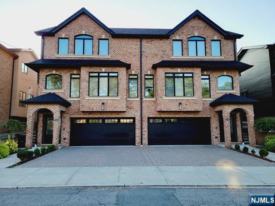 ALL BRICK OVER SIZED DUPLEX ON THE 2ND ST. LIKE NEW MINT CONDITION. EXQUISITE DESIGN OPEN LAYOUT WITH FINEST MATERIALS AND APPLIANCES. 4 HEATING, 2 A/C ZONES, ALL HARDWOOD FLOORS THROUGHOUT, SPACIOUS EAT IN KITCHEN WITH DECK, FIRE PLACE, HIGH CEILING WITH BEAUTIFUL CROWN MOULDING, LARGE FAMILY ROOM WITH FULL BATHROOM AND SEPARATED ENTRANCE. 2 CAR GARAGE WITH 2 OUTSIDE PARKING SPACES. WALKING DISTANCE TO NYC EXPRESS BUS. CONVENIENTLY LOCATED TO SHOPS, PARKS, MAJOR HIGHWAYS, SCHOOLS, GW BRIDGE. MOVE IN READY CONDITION!