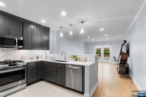 Photo of 148 The Promenade, Edgewater, NJ 07020 (MLS # 26028772)
