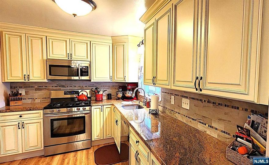 Welcome to this beautifully maintained ranch-style home in the heart of Pine Brook, NJ! Charming residence features three bedrooms, one & a half baths, perfect for comfortable living. Enjoy your private deck and backyard, ideal for outdoor gatherings or peaceful relaxation. Sunny den provides a cozy space. Full finished basement, laundry room, living room and dining room offers convenience and functionality for everyday life. With central air conditioning, your comfort is guaranteed year-round. Enjoy benefits of water filtration system for pure peace of mind. Kitchen is equipped with stainless steel appliances, including a refrigerator, gas range, microwave, and dishwasher, making meal prep a delight. Also includes car garage and driveway, making parking a breeze. Conveniently located near schools, parks, transportation, shopping, and dining, this home is well-situated for a vibrant lifestyle. Don't miss out on the opportunity to make this wonderful house your new home!