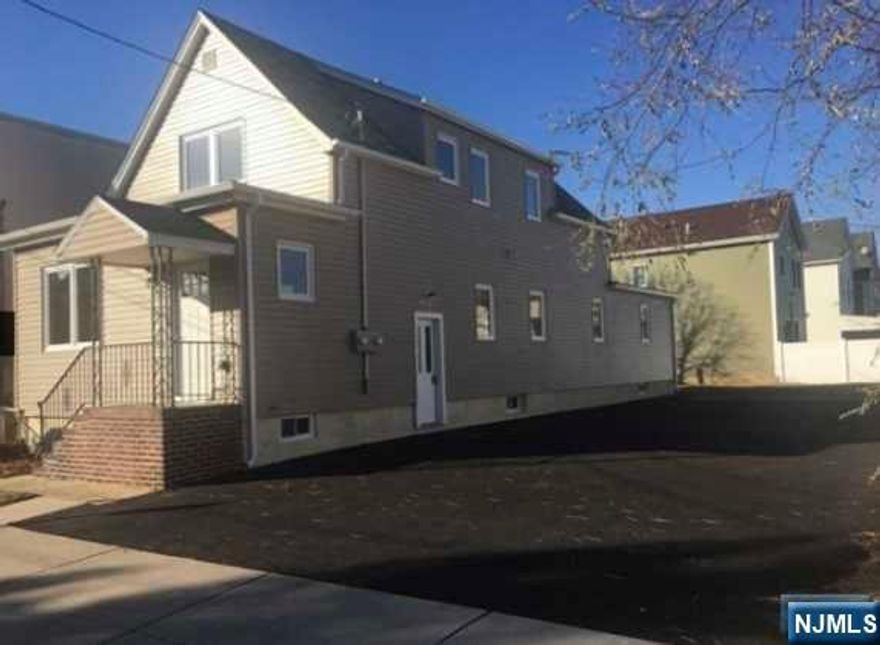 Renovated 2 family home, with 4-6 car driveway, separate utilities, central air, and plenty of closet space. Acoustical sound ceiling. Walking distance to schools, parks and NYC bus. 1st fl: Kitchen, Living room, 3 bedrooms, 1.5 bathrooms. 2nd fl: Kitchen, living room, 2 bedrooms, 1 bathroom.