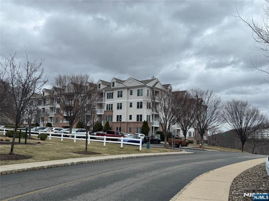 Don't miss this Hickory model 2-bed, 2-bath condo with breathtaking views! Located on the 3rd floor, this 1,152 sq. ft. unit offers elegance, privacy, and convenience just steps from the side entrance. Features include custom walk-in closets, a built-in office nook, an open-concept kitchen with a center island and granite countertops, and a balcony off the dining area. In-unit laundry, assigned garage parking, and a new boiler. Secure building with entry system for foyer, mailroom, and more. Enjoy clubhouse, gym, tennis, pickleball, basketball, poker and party rooms. Pet-friendly. Near shopping, dining, and highways!