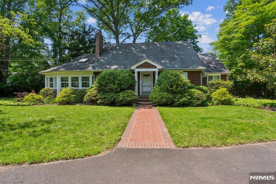 Experience unmatched privacy on approximately 3/4 of an acre of secluded Park-Like land. This custom built home features a Living Room, Dining Room, 3 bedrooms, 1 full bath, 1 half bath, a charming Cherry Wood room that can be used as an office or den with custom windows, built-ins and a sky-light, and an unfinished basement with tons of potential. Hardwood floors in the living area, walk up attic (full length of the house) with potential to finish and double the size of living space. Detached 2-car garage, stainless steel appliances and custom maple cabinetry. Don't miss this unique property that offers unparalleled privacy and potential.