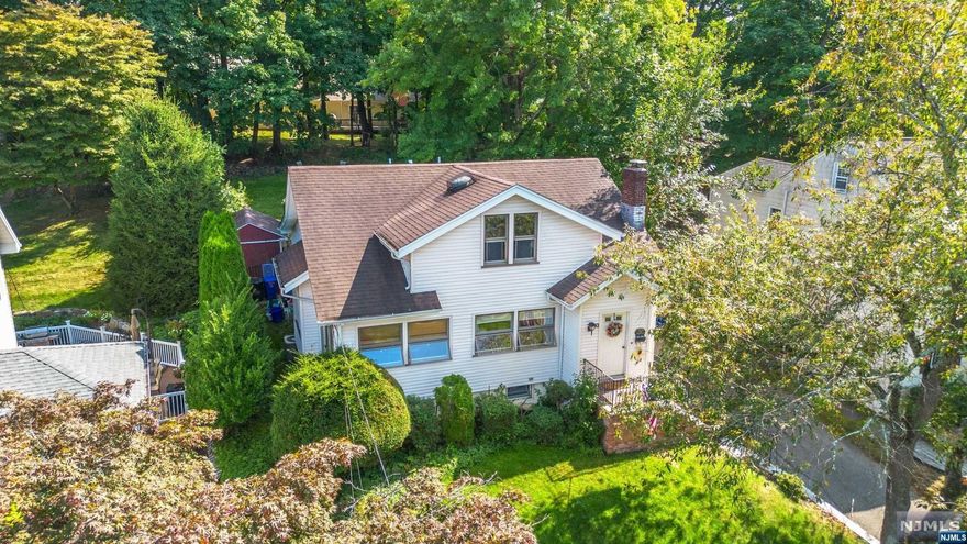 Drive down the sunny tree-lined street and make a stop to see this picture perfect home! Soak in the charm of this delightful 4 bedroom that boasts beautiful hardwood floors, flexible and spacious layout & an amazing neighborhood. Living room w/ wood burning fireplace, formal dining room, eat-in kitchen with plenty of countertops & SS appliances with adorable breakfast nook, mud room & bonus room (Den) on 1st floor. The 1st floor also has a Large bedroom (perfect Primary) w/2 closets plus a nicely updated full bathroom in hall. Upstairs you will find 3 additional bedrooms and a "coastal" inspired full bath w/ beautiful tile & large stall shower. Plenty of additional storage space in the full basement waiting to be finished with your personal touches & imagination! Enjoy the outdoors on the paver patio & large 2-tier yard. Proudly situated in Washington School District & close to the hustle and bustle of the "Ave," Caldwell's famous & vibrant downtown