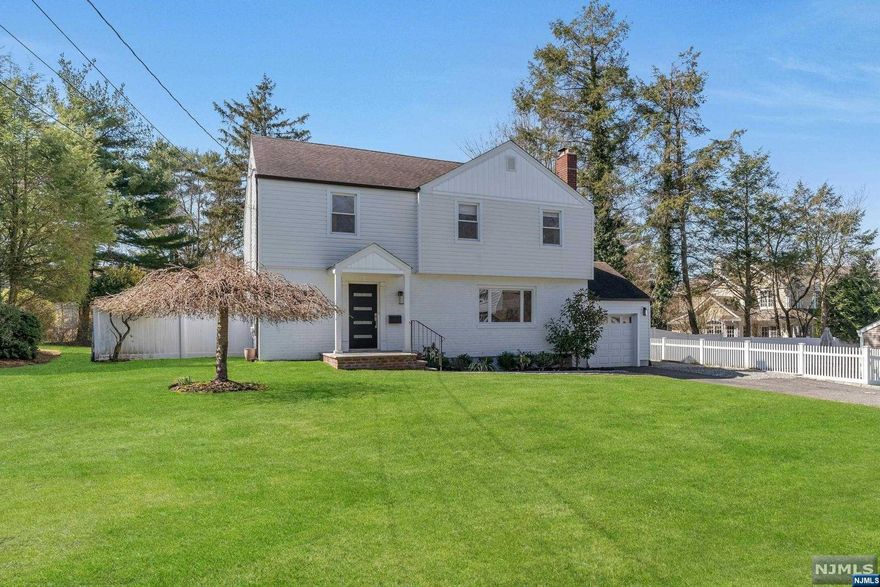 Location, Location, Location!! Tastefully renovated & well maintained 4 BR & 2.5 BTH colonial home in prestigious Tenafly East Hill, close to NYC bus stop, Smith elementary school & houses of worship. South facing windows bring in lots of natural sunlight creating bright & lively indoor space. Large flat lot (75X152) is fully fenced in & beautifully landscaped providing perfect outdoor space for gatherings and relaxing. Open convenient layout w/ hardwood floors throughout. All bedrooms are bright and comfortably sized w/ large closets. Dry finished basement w/ ample storage. New updates include roof (2016), hot water heater (2017), kitchen (2018), french drain (2018), bathroom vanities (2018), central A/C (2018), washer (2021), backyard patio/fence/fire pit/landscaping (2022), siding/gutter (2023), front door (2023), heating furnace (2023), etc. Ready for you to move in before the new school year starts!