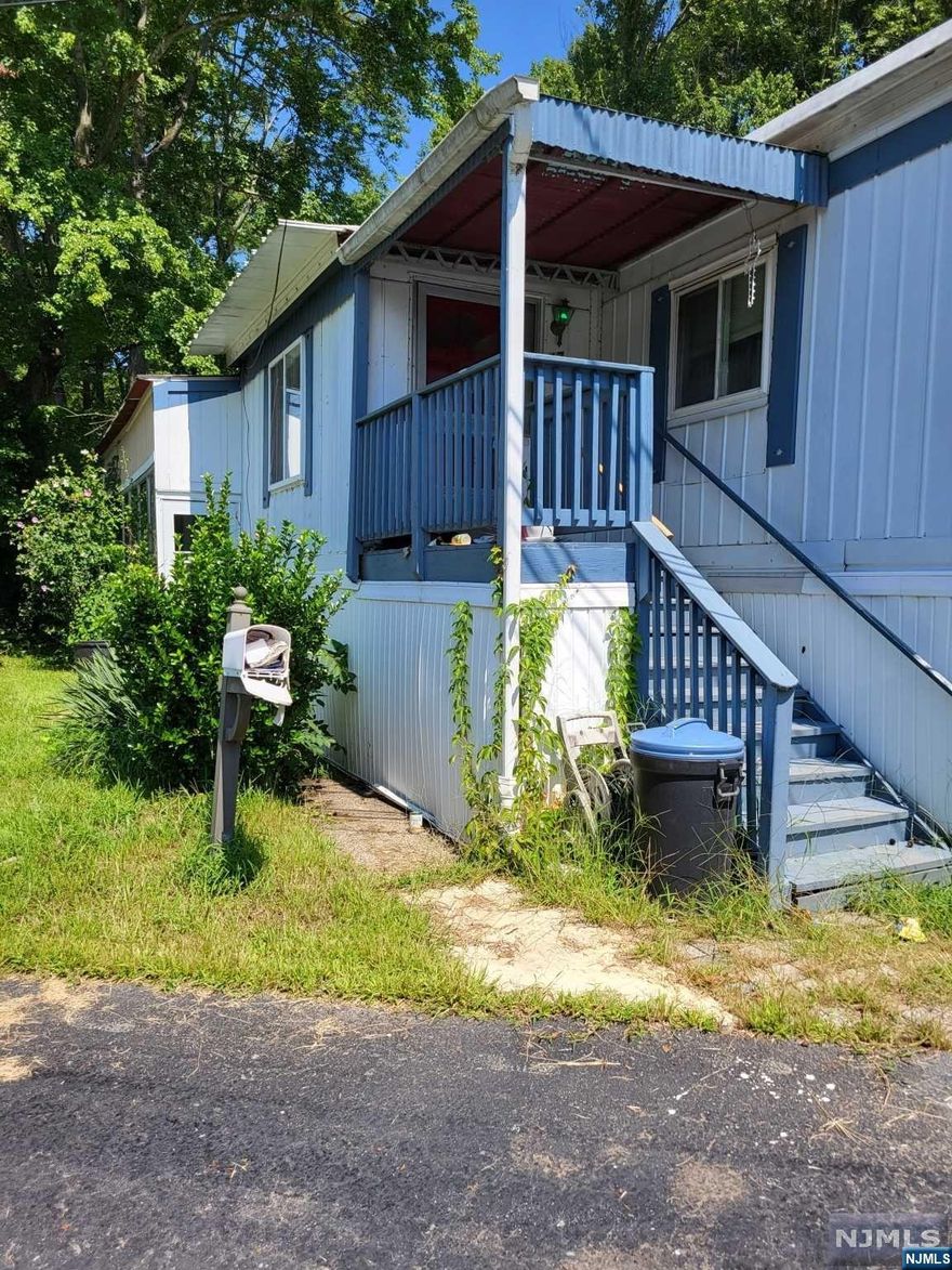 Easy living in this cozy 2 bdrm, 1 bath trailer home renovated in approx 2013. The bright open kitchen offers under cabinet lighting with breakfast bar and an eat-in area and oversized living room. Off to the side is a greenhouse/sunroom which can be used for many different purposes. There is a large storage shed in the back. Enjoy all the amenities Wayne has to offer while being just minutes from major highways and shopping. Finns Mobile Home Park also has a playground, laundromat and clubhouse. Home being sold AS IS. All perspective owners must be approved by Finns Mobile Home Park by submitting an application for approval prior to purchase.