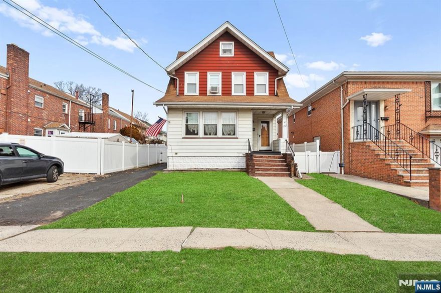 Arlington Section of Kearny...Renovated 1 family Colonial Style Home featuring 4 bedrooms, 2 full baths with finished attic and basement. Great home to entertain. With 4 car+ driveway and a 2 car detached garage. With an above groundpool with an attached deck. Close to New York City Bus Transportation, State of the art sports complex, park, turnpike, Lincoln & Holland tunnel to NYC. A MUST VIEW!