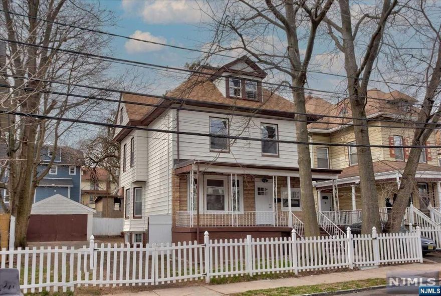 A rare find 5 bedrooms 2 bath. First level offers, entrance foyer, spacious open floor living room, dining room, kitchen with stainless steel appliances. The Second level offers 3 large bedrooms, and a full bath. Third floor offers 2 more spacious bedrooms full bath with two walk in closets. Hardwood floor throughout. One car garage plus driveway for 2 cars, and a private big back yard. Take advantage of the low property tax. Come and make this your dream home!