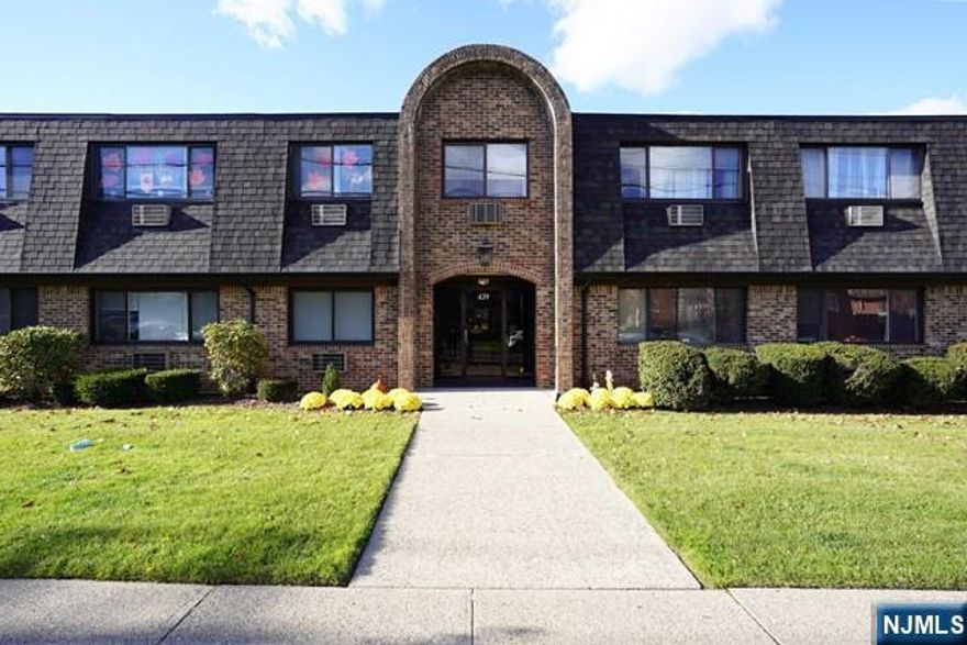 Lovely first floor one bedroom apartment conveniently located close to NY/NJ buses, shopping, school and major highways, This units offers: Living room, dining area, with nice wood flooring, updated kitchen, large bedroom, full modern bath, two wall A/C, two assigned parking space, one in the garage, one outdoor. Coin/ card operated laundry facility in the basement and one gage storage. Heat, hot & cold water included. Credit check and interview required. No smoking in the premises. Pets Conditional.