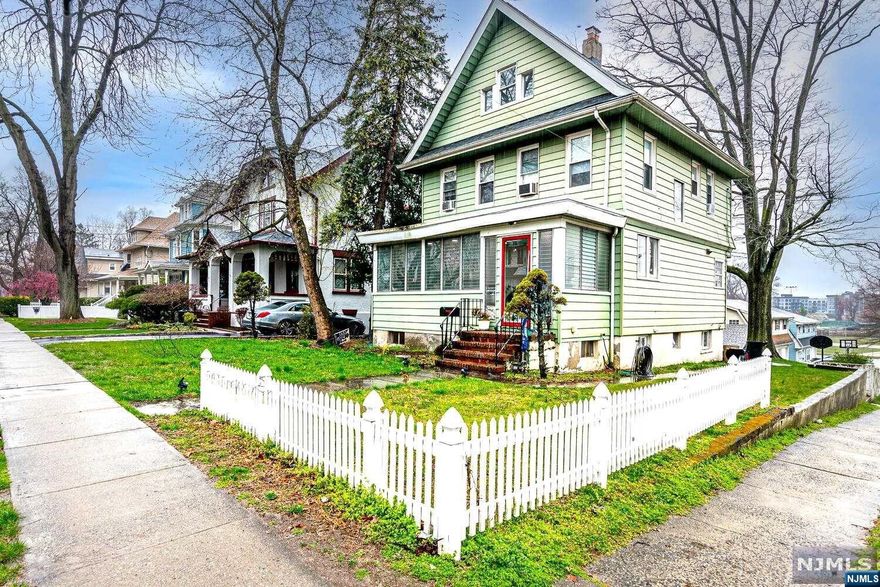 Back on Market! Welcome to your soon to be home, colonial style with a lot of character. Located about 7 miles from NYC, Offering on the first level, a very inviting living room accessed from the front entrance, connected to a formal dining room with fireplace and a bright kitchen with full pantry, next to 2 coat closets. Going downstairs, you will find another separate entrance door to the left, and moving to the right, you land on a full finished basement with ample family room, full bathroom, laundry room and utilities room. Upstairs, on second floor, you encounter 4 great size bedrooms and closet space, plus another full bathroom. And, it doesn't stop here, moving up to the third floor, you have a loft area, plus another fifth bedroom. An enclosed front porch and two detached car garages, add to this house, all the space you need. Roof completely replaced 8 years ago. Garage roof as well. This classic charming Five Bedrooms home can be yours! VERY Easy to Show.