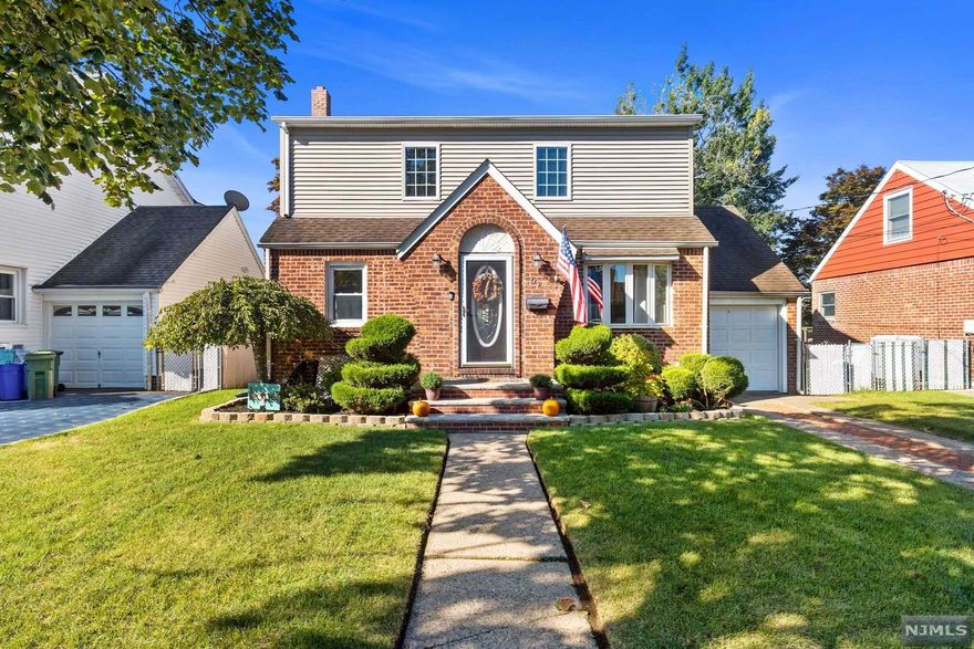 his updated expanded cape is warm and inviting located close to schools, parks, shopping, NYC and all major highways. This 4 bedroom 2 bath home has been renovated with an oversized air conditioning condenser, newer kitchen and baths and has a great entertaining space in the full finished basement with bar. This home has plenty of space for storage. Also has an attached garage. The backyard is great to relax with a firepit area, pool and deck. All vinyl cased windows with Brick and vinyl siding that will last for years to come. This home is in a desirable neighborhood and will not last long in this market.