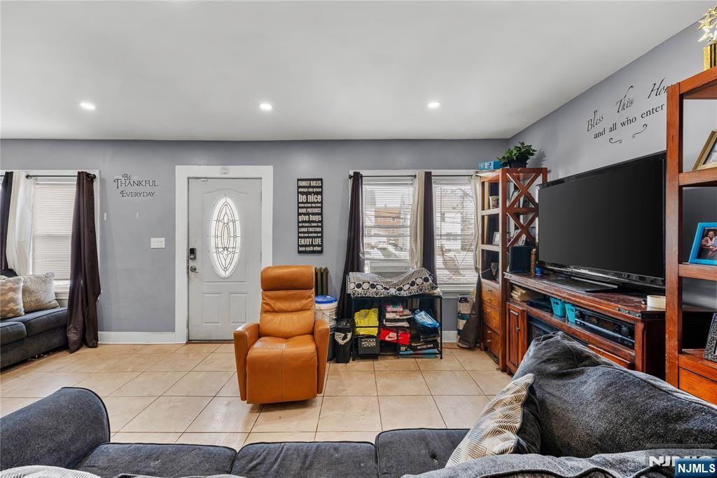 Photo of 280 8th Avenue, Paterson, NJ 07514 (MLS # 26003975)