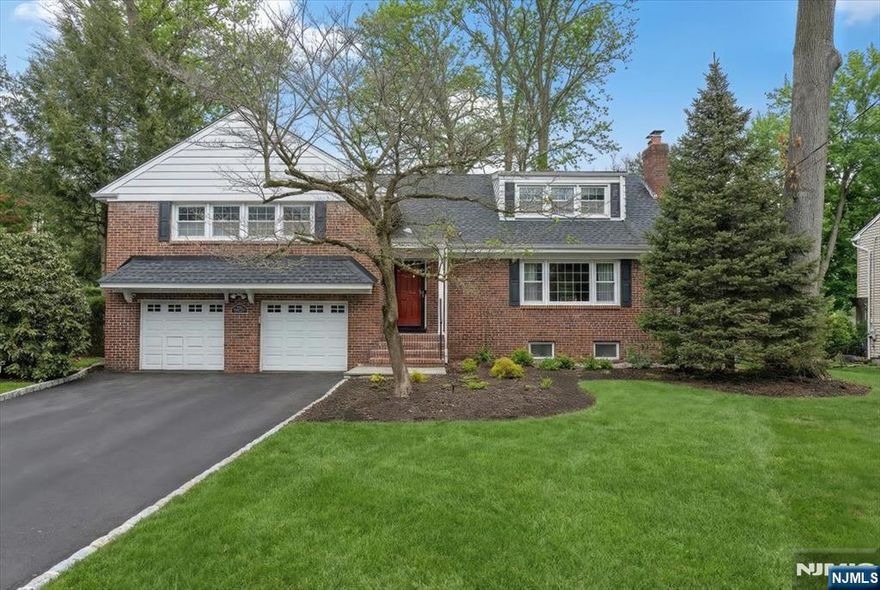 Beautifully renovated split-level home in the sought-after Latch String section of Oradell. An inviting entry foyer opens to an oversized, sun-filled living room with a charming fireplace, creating a warm and welcoming space. The dining room features access to a covered porch overlooking a spacious, landscaped yard, perfect for entertaining. The generous eat-in kitchen offers granite countertops and ample workspace, completing the main level. Just a few steps down, youll find an expansive family room with a powder room and direct access to the two-car garage and full unfinished basement, offering excellent storage and future potential. The second level includes a primary suite, two additional bedrooms, and an updated full hall bath. The top level features an oversized fourth bedroom with a large closet and attic access. Ideally located near schools, parks, shopping, and convenient transportation, this home offers a wonderful blend of modern updates and classic suburban living. A fantastic opportunity to settle into one of Oradellâ€™s most desirable neighborhoods.