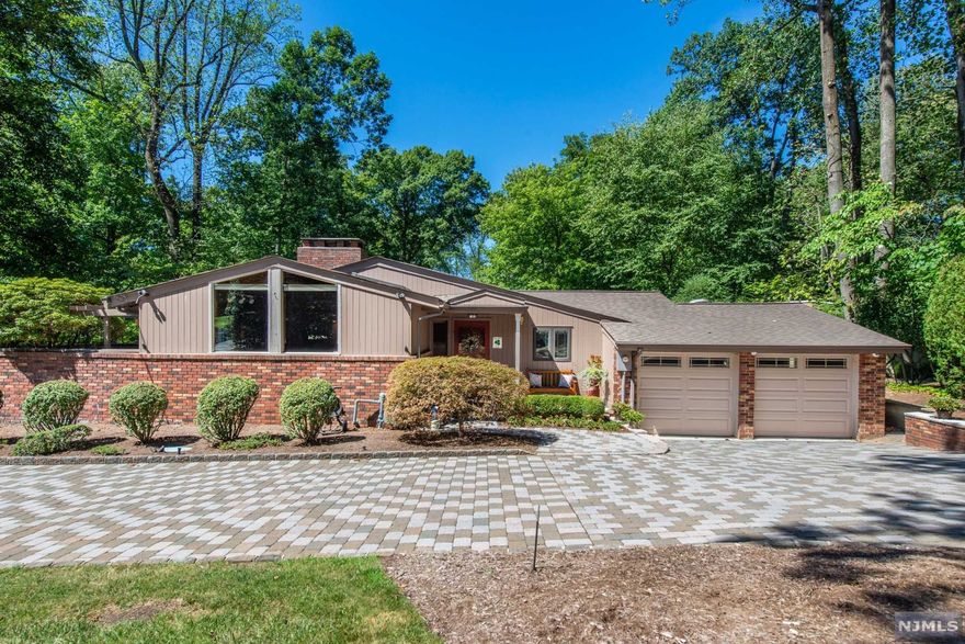 This Classic Mid Century California Ranch Has It All !! The Living Room Features Parquet Floors, Front Window Wall, Brick Gas Fireplace. The Formal Dining Room Has Space For a Table Of Eight And Looks Out Over The Large Private Lanai. The Updated Kitchen Has A Separate Eating Area Plus Breakfast Bar. The Primary Bedroom Was Added To The Home And Is Awesome. Private Bath W/ Dual Sinks, Steam Shower, Huge Walk In Closet, Bedroom W/ Skylight, Sliders To Private Deck. The Junior Primary Bedroom Enjoys Sliders To The Same Private Deck, And Includes A Private Bath. Downstairs Features A Rec Room, Laundry, And Work Room. There Are So Many Additional Features Natural Gas Generator, Heated Front Paver Driveway, 3rd Garage In The Rear, Deep Rear Yard