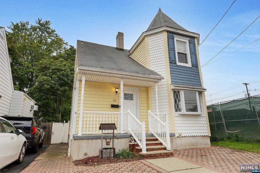 1 family home just a half block to the Train Station & NYC Bus stop!! Living room/dining room combo, eat in style kitchen with skylight and rear door to large rear yard with patio, 2 bedrooms & full bath on 2nd floor. Pull down stairs to attic storage. Full partially finished basement, with toilet, laundry hookups and family room with rear door leading to yard. Laminate floors, freshly painted. Large rear yard with shed. 2 zone gas hot water baseboard heating system, 3 built in air conditioners. Just steps to shopping, restaurants, public transportation & shops! Member of LLC holds NJ Real Estate Broker License.