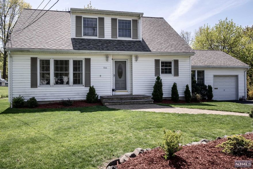 Nothing to do but move right into this quaint updated 3 Bedroom, 2 Full bath Expanded Cape Cod situated in a gorgeous Collins neighborhood. The home features Hardwood floors throughout the first floor, Formal Living Room with electric Fireplace, Eat in Kitchen with freshly painted white wood cabinetry, Formal Dining Room, step down to a spacious Family Room with access to the garage entry & sliders to the deck and rear yard, 1st Floor Bedroom and Full Bath. The 2nd floor is home to the Primary Bedroom, 3rd Bedroom and Main Bathroom. Full finished Basement with a spacious recreation room,, laundry and storage/utility rooms plus bilco door access to rear yard. In addition to the attached garage you'll find a detached garage that is used as a storage shed. Additional upgrades include vinyl siding, vinyl replacement window, Furnace 2020, A/C 2020, Dryer 2022, New roof 2019, basement newly painted 2022, and new upstairs carpet 2020.