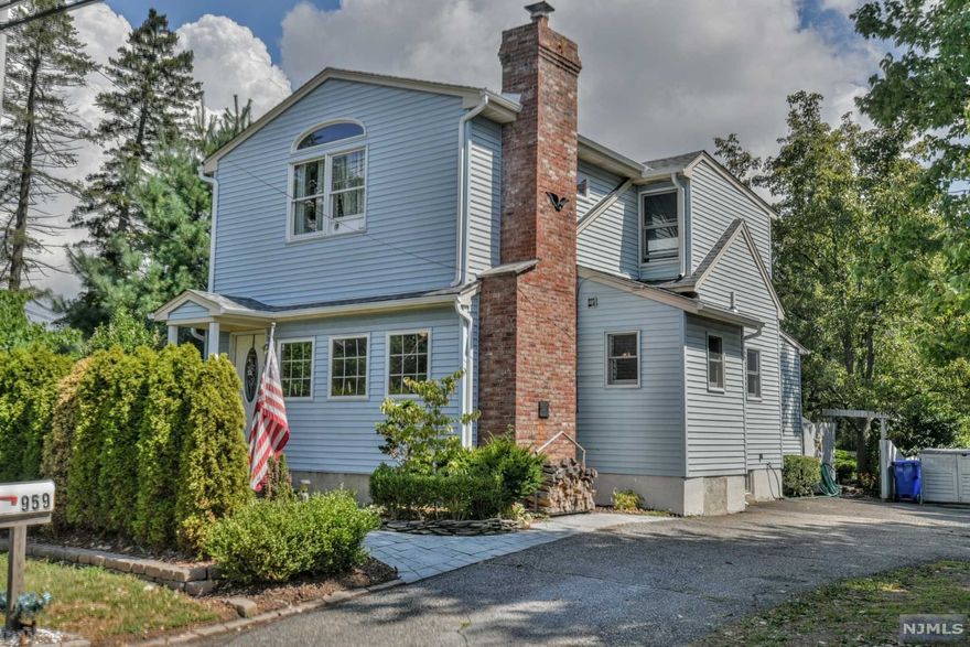 Move right in to this recently updated 3 bedroom, 2 bathroom side hall colonial with low Totowa taxes and no flood zone. This open concept home features hardwood and tile throughout. Easy access to all major highways and NYC bus across the street. Level backyard is perfect for play space, entertaining and your garden.