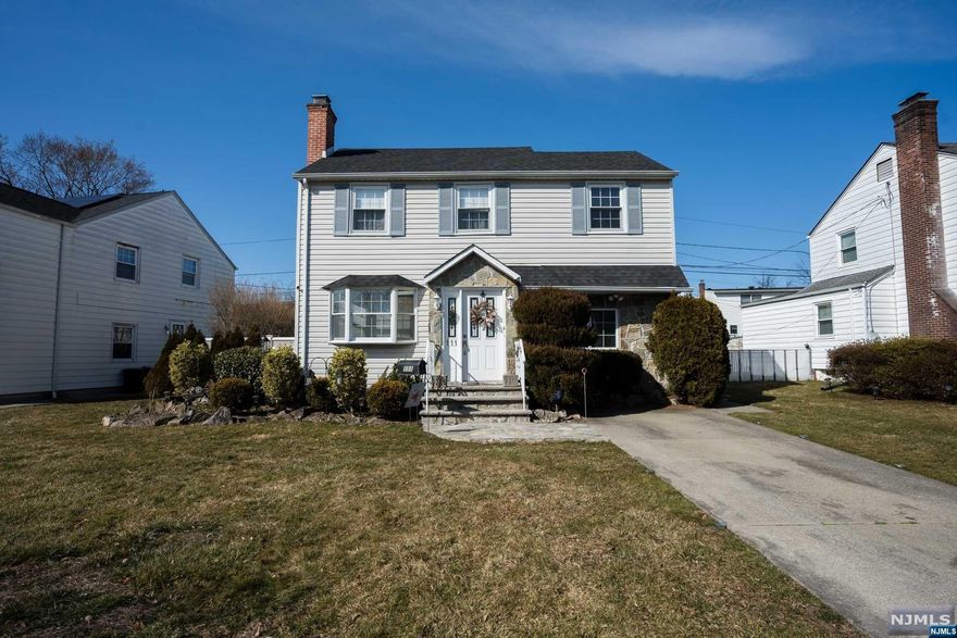 NOTHING TO DO BUT MOVE INTO THIS VERY WELL MAINTAINED BEAUTIFUL STONE FRONT COLONIAL ON A QUIET TREE-LINED STREET IN THE HEART OF ELMWOOD PARK. CENTRAL AIR. WOOD BURNING FIREPLACE IN THE TILE FLOORED LIVING ROOM. SKYLIGHTS IN FAMILY ROOM. ALL STAINLESS STEEL APPLIANCES. BUILT IN SECURITY SYSTEM. ROOF WAS REPLACED IN 2019. HOT WATER TANK AND FURNACE REPLACED IN 2017. FULL BATH ON THE 1ST FLOOR. HARDWOOD FLOORS IN THE 1ST FLOOR BEDROOM. 3 BEDROOMS UPSTAIRS ARE ALL A GENEROUS SIZE WITH LARGE CLOSETS. ANOTHER FULL BATH ON THE 2ND FLOOR. BASEMENT IS FULL AND FINISHED. WASHER/DRYER IN BASEMENT AND THE SHED IN THE FENCED IN BACKYARD ARE INCLUDED WITH THE SALE. HOUSE IS LOCATED CLOSE TO BEAUTIFUL ELMWOOD DRIVE PARK AND ONLY 18 MILES TO PENN STATION.HOUSE BEING SOLD STRICTLY "AS IS" WITH NO KNOWN DEFECTS.