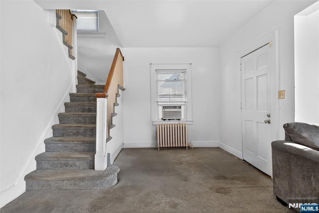 Photo of 111 Ellington Street, East Orange, NJ 07017 (MLS # 25043322)