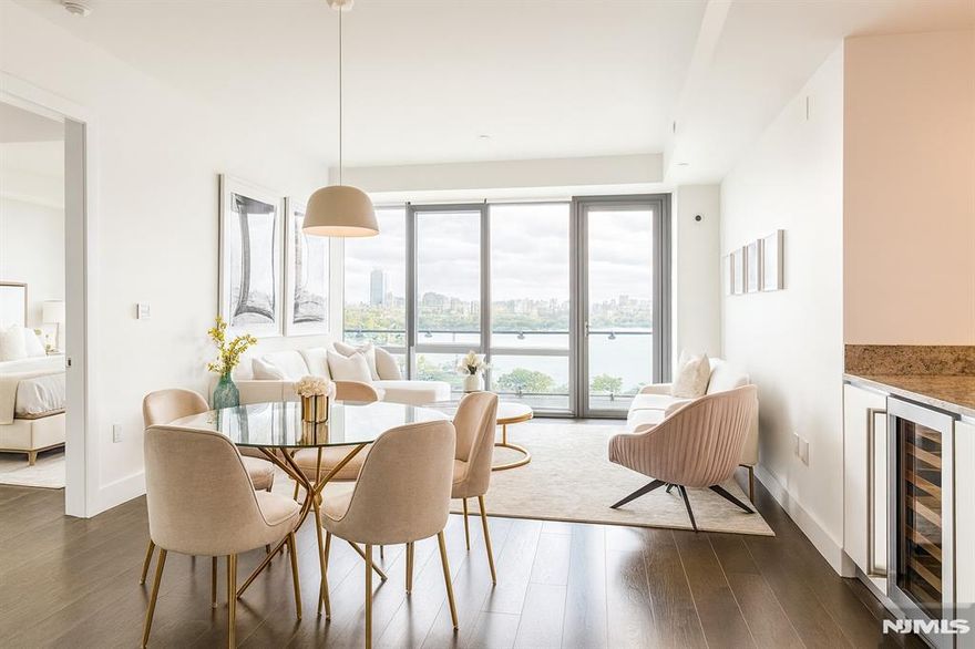 Unit 321 at One Park Condos Looking for space, style, and stunning views? Welcome to Unit 321, where modern design meets sweeping skyline views â€” right on the Hudson. This sun-drenched 3-bedroom, 2-bath home features 1,555 sq ft of open living space and a 276 sq ft private terrace, all facing south with uninterrupted views of Midtown Manhattan and the Hudson River. From the bedrooms to the living room, natural light pours in all day. Head up to the rooftop (accessible by elevator or stairs) for even more incredible views â€” perfect for sunset lounging or weekend entertaining. Commuting? Youâ€™re covered: NYC-bound bus stop just outside Free shuttle to Port Imperial Ferry (only 8 minutes to Manhattan) Hudson-Bergen Light Rail is right across the street At One Park, luxury goes beyond your front door. Residents enjoy: A 55-foot indoor heated pool State-of-the-art fitness center Cozy residentsâ€™ lounge High-end golf simulator Indoor kidsâ€™ playroom Outdoor BBQ area with fire pits Innovative robotic valet parking And yes â€” pets are welcome. Unit 321 is more than just a home â€” itâ€™s a lifestyle. All thatâ€™s missing is you.