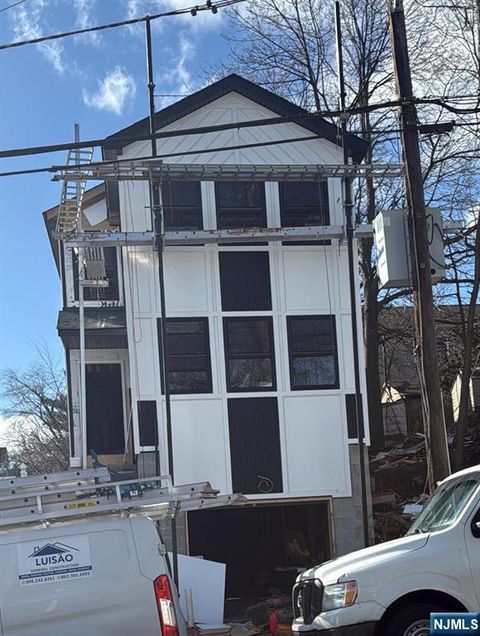 Photo of 131 Temple Street, Paterson, NJ 07522 (MLS # 26005959)