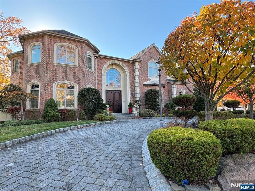 Located in the prestigious North Cliffs area, this beautiful 2007 colonial brick house features a first floor with an elegant two-story foyer, formal living room, banquet dining room, warm and inviting family room with fireplace, and an eat-in gourmet kitchen with appliances. An office/bedroom with a full bathroom, powder room, and laundry room complete the main floor. The second floor offers a primary suite with a sitting area/office, spa-like bath, and oversized closets. There is one ensuite bedroom and two bedrooms with a Jack and Jill bath. The fully finished basement includes one bedroom, a full bath, and a summer kitchen. Additional features include a three-car garage and a fenced yard. Fully furnished, move in with your suitcases. (Interior photos were taken in 2024, and some furniture has since been replaced or removed.)
