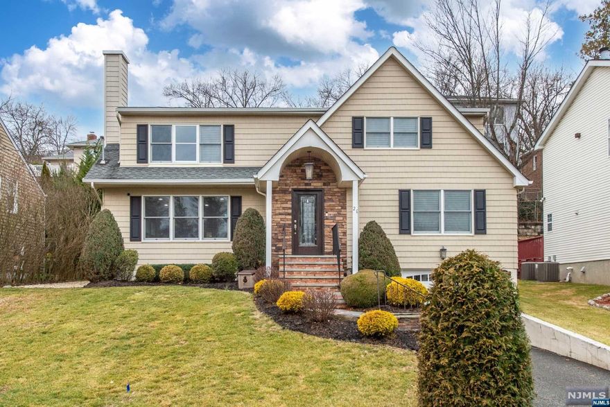 Welcome home to modern living with over 2900 sqft of meticulously maintained living space. Located on a quiet, dead-end st, this 5 bedroom, 5 bath stunner is waiting for you. Step into your contemporary, open-flow foor plan with a large living room, spacious formal dining area, more family space, and your large kitchen with 2 dishwashers & 2 sinks, and a robust island, all flooded with natural light from both sides of the home. This home is prime for intergenerational living and guests with 2 1st floor bedrooms, with 1 ensuite. Head upstairs to your primary bedroom with an ensuite bath, as well as two more expansive upstairs bedrooms. This functional & thoughtful home has 2 laundries (one in the basement and one on the 2nd flr) for convenience, and you can control your temperature with Nest. Watch your new life flow from room to room, with all the space you need to be comfortable. Finished basement, attached garage, close to highways, schools, & shopping.