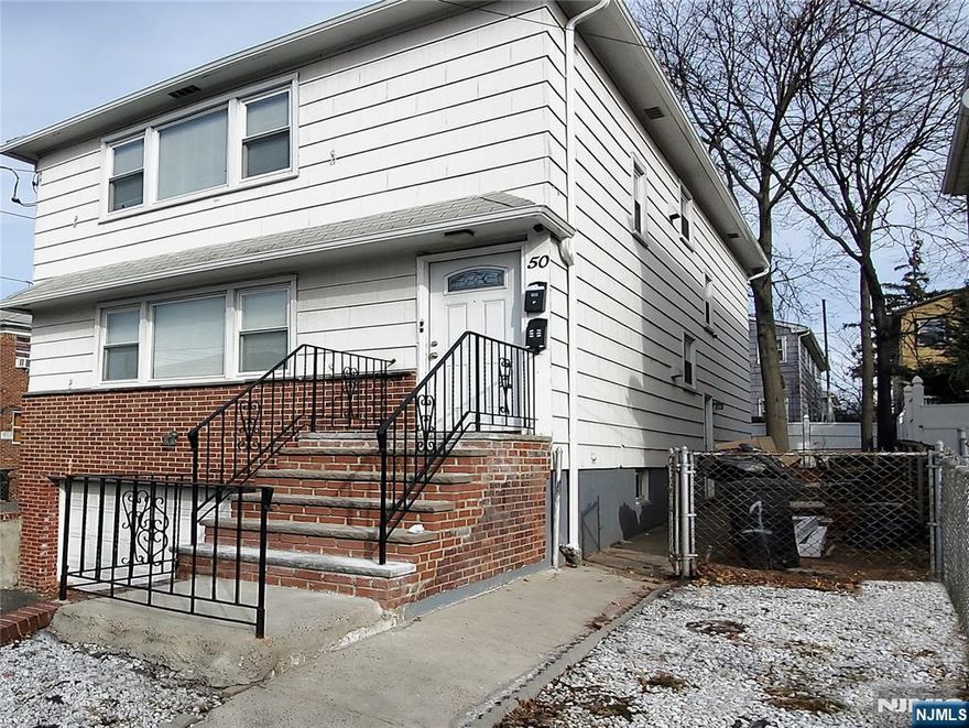 Well-maintained and renovated two-family property located in a convenient Irvington neighborhood, offering a great opportunity for both investors and owner-occupants. Each unit features two bedrooms with well-kept flooring throughout. Property includes a built-in garage, providing added convenience. Ideal for buyers seeking rental income or the option to live in one unit while offsetting expenses with the other. Conveniently located near major transportation, with easy access to NYC commuting options and close proximity to major highways including the Parkway. Move-in ready with strong income potential in a desirable and accessible location. Act fast, do not miss your chance to make this multifamily property your new home!