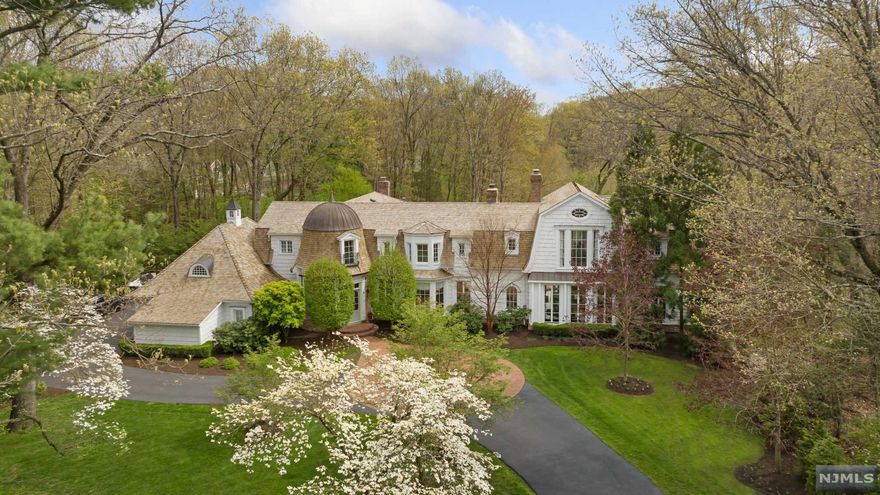 SHOWCASE ESTATE IN PRESTIGIOUS URBAN FARMS WEST GATE ON 1.3 ACRS THAT BACK UP TO GREENACRES PRESERVE. CUSTOM BILT BY W/EXQUISITE DETAIL & CSTM WOODWORK.NEWLY RENOV KTCHN TAKES GLAMOR TO THE NEXT LEVEL W/ HERRINGBONE WOODFLRS,CUSTOM CABINETRY,SLEEK ISLAND,MIELE APPLANCS INCLD. BUILTIN COFF.MACHINE. SUNNY DINING AREA W/FLR TO CEILING WNDWS OVERLOOKING PRVT BACKYRD OASIS W/PATIOS & POOL. STUNNING BANQUET SIZED DR W/FPL. DESIGNER LR OFFERS CLASSIC & CONTEMP SPACE W/FPL, BILLIARDS RM W/FPL/WET BAR. 2 PWDR RMS, LNDRY RM, TONS OF CLOSET SPCE, GUESTRM W/ENSUITE BTH & OUTDOOR ACCESS COMPLETES 1ST FLR. 2ND FLR PRIMARY SUITE HAS FLR TO CEILING WNDWS W/FRENCH DRS LEADING TO BALCONY OVERLOOKING POOL & GARDENS,FPL,WIC& 5 PIECE BTHRM. DOWN THE EXPANSIVE HLLWY 2 ADD. BEDRMS W/SHARED ENSUITE BTHRM & BR W/ENSUITE BTH. THE FINISHED LOWER LVL INCLDS GYM,ENT RM W/TEMP CONTROL WINE STRG SYSTM,FBTH&BDRM. THIS HOME ENJOYS IDEAL PRIVATE PRIVATE CUL DE SAC LOCATION!