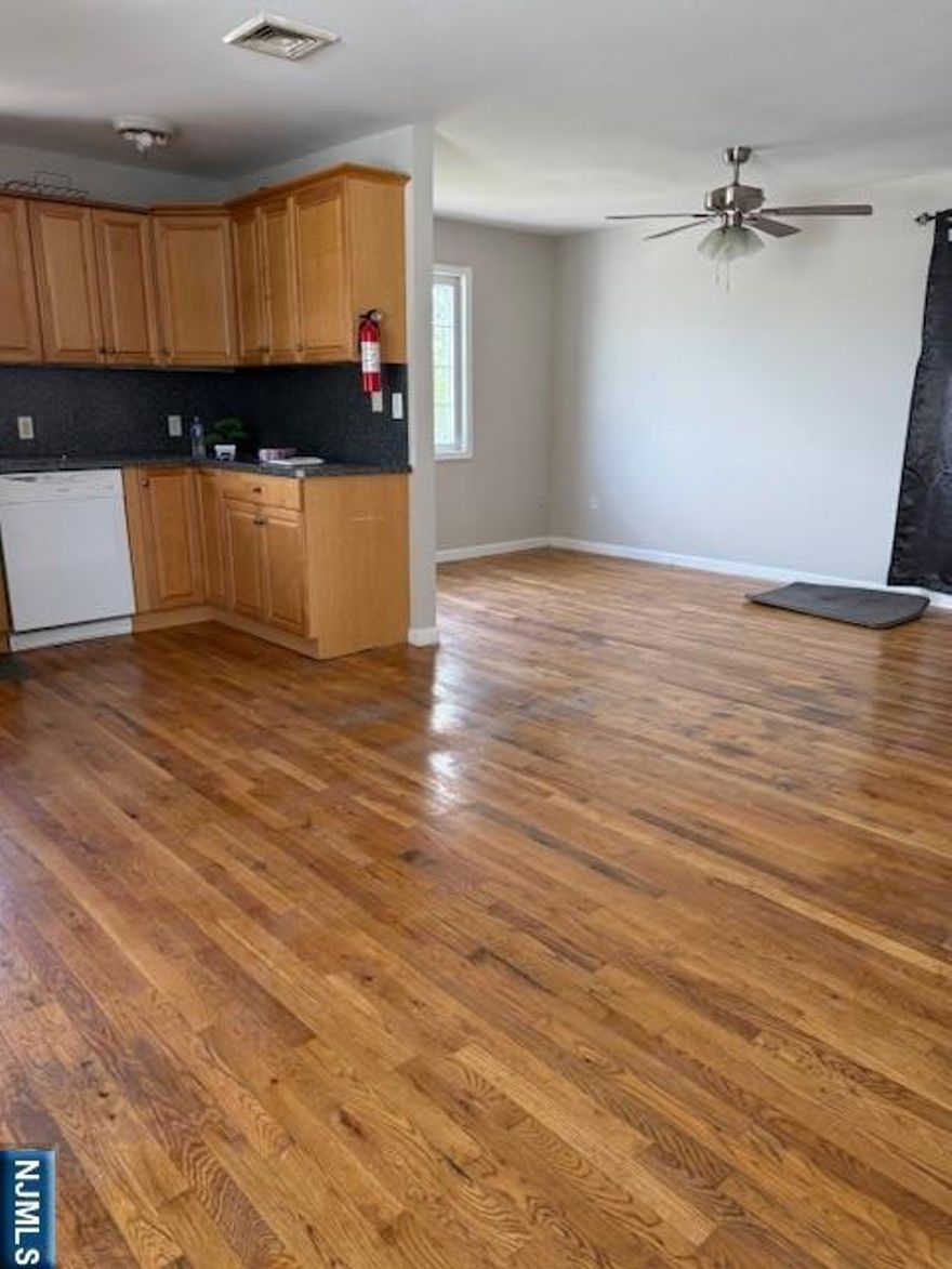 Beautiful and young 2-family home in the heart of booming Hackensackexpress NYC transit on the corner of street. Many stores and restaurents nearby.Spacious kitchen and livingroom ,2bedrooms with fullbath and washer/Dryer in unit. 3rd floor has large attic can be used as a room. You must see it!!! NO PETS ARE ALLOWED.Street parking only.