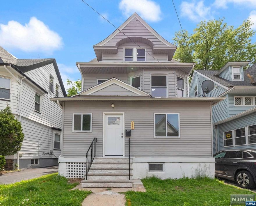 Welcome to this stunning renovated colonial home located in the heart of Orange, NJ! Boasting 5 bedrooms and 3.5 baths, this spacious residence features an open-concept layout, perfect for modern living. Situated on a quiet street, this property offers a tranquil escape from the hustle and bustle of city life. The partially finished basement provides an ideal space for an entertainment room, while the driveway for 4 cars and 1-car garage offer ample parking options. Conveniently located near shops, schools, and transportation, this home offers both modern and convenience. Don't miss the opportunity to make this your dream home!