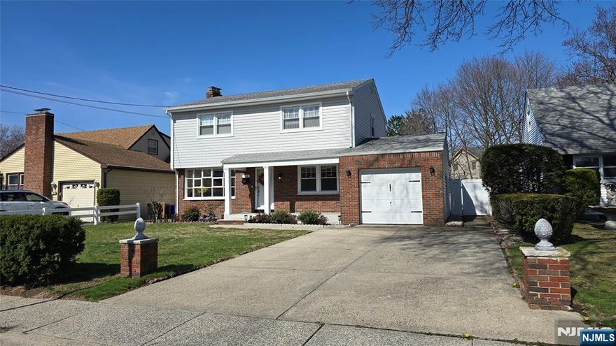 Charm, Comfort, and Convenience Combined This fully renovated 3-bedroom, 2.5-bath Colonial is filled with natural light and timeless style. A welcoming covered front porch adds classic curb appeal, enhanced by mature hedges that provide a natural privacy screen from the street. Just across the way, enjoy direct views of Saddle River County Park, with open fields, walking paths, and a peaceful fountain. Inside, you'll find a spacious living room with a wood-burning fireplace, a formal dining room with custom millwork, an updated kitchen featuring a large peninsula and center islandâ€”open to the dining area for easy entertaining. A cozy den/office just off the kitchen includes access to the backyard, and a powder room completes the first floor. Upstairs offers two well-sized bedrooms, a full bath, and a private primary suite with its own bathroom. The finished basement includes a rec room with fireplace, laundry, and utilities. Central air was added, siding replaced in 2022, providing modern comfort and lasting value. The fenced backyard offers space to relax or entertain. Enjoy NYC bus service right at your doorstep, with Saddle River County Park just across the street for recreation and green space. Conveniently located near shopping, major highways, and close to Fair Lawn's vibrant amenitiesâ€”this move-in ready home offers comfort, updates, and solid value in a well-connected setting. Text Listing Agent Joanne Cheng, Coldwell Banker, 201-923-5282 for showing and inquiry.