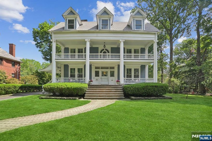 This stunning New Orleans-style Colonial is a true showstopper, with grand stately columns and a full-width second-floor balcony that makes an unforgettable first impression. Located in the historic Montrose section of South Orange, this beautifully updated home offers timeless charm with modern comforts.Just minutes from the Mid-Town Direct train, it's a commuter's dream. Inside, you'll find an upscale kitchen, a brand-new primary bath, multi-zone central air, and a full-house generator. Step outside to your own private oasis featuring an in-ground heated saltwater pool perfect for relaxing or entertaining all summer long.Enjoy the best of suburban living near vibrant downtown South Orange, with access to the Performing Arts Center, boutique shopping, diverse dining options, and outdoor recreation. This home is a rare blend of architectural elegance and contemporary luxury.