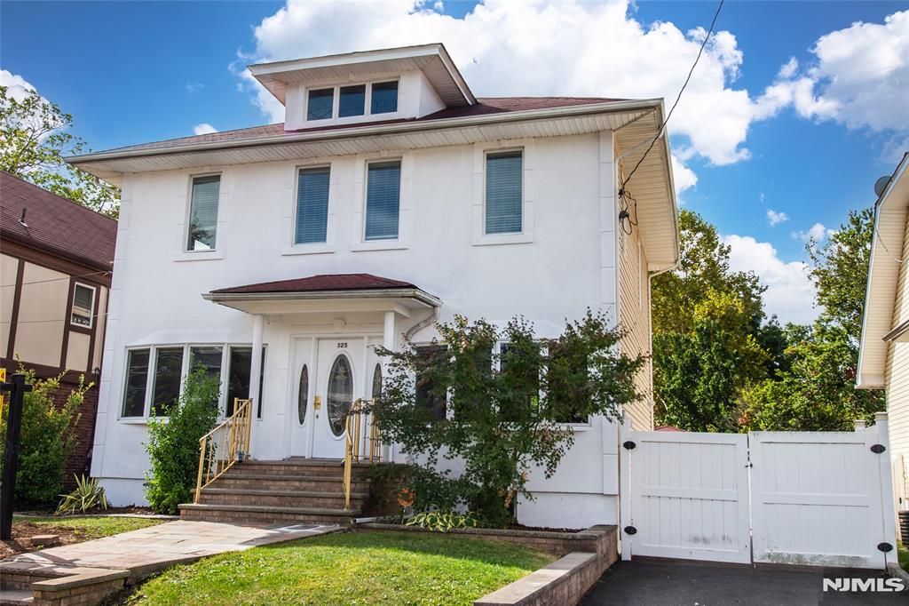 Photo of 323 Van Houten Avenue, Passaic, NJ 07055 (MLS # 26009357)