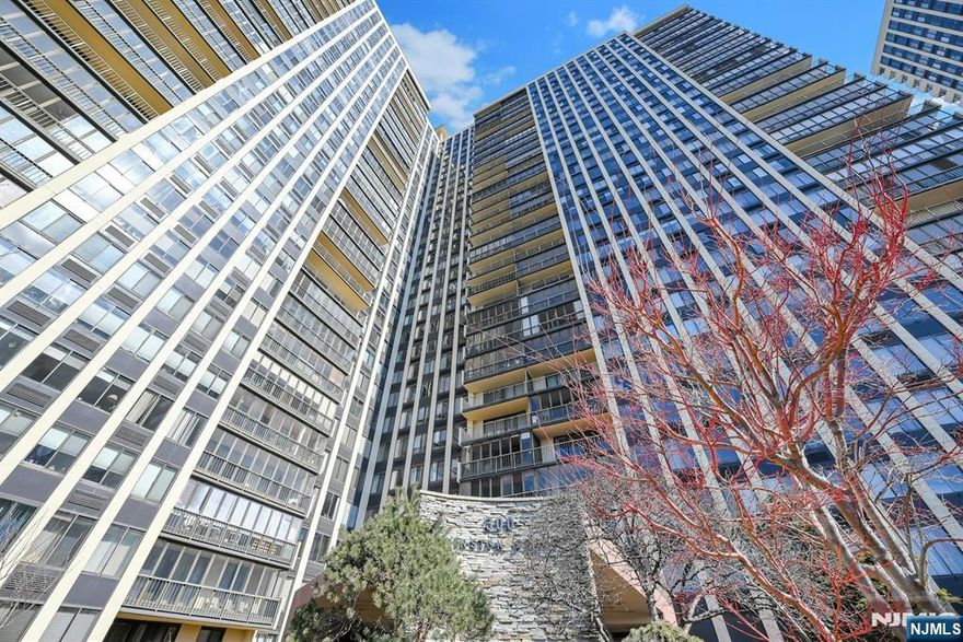 DELIGHTFULLY BRIGHT & LARGE 2 BEDROOM/2 BATH CONDO IN DESIRABLE WINSTON TOWERS, A FULL AMENITY LUXURY CONDO HIGH-RISE COMMUNITY. THIS 1,211 SF APARTMENT + 102 SF ENCLOSED BALCONY WAS FULLY RENOVATED SEVERAL YEARS AGO. THE EAT-IN-KITCHEN HAS GRANITE COUNTERS , STAINLESS STEEL APPLIANCES AND SOLID WOOD CABINETRY WHICH WAS JUST REFINISHED IN FEB. 2026. MASTER SUITE INCLUDES HIS & HERS WALK-IN CLOSETS AND A SPACIOUS BATHROOM, FULLY TILED, WITH REFINISHED SOLID WOOD VANITY, GRANITE COUNTER & LARGE WALK IN SHOWER. THE HALL BATH IS ALSO TILED, WITH GRANITE COUNTER & WOOD CABINETS. THE APARTMENT WAS FRESHLY PAINTED IN DESIGNER DECORATOR'S WHITE. THE UNIT HAS RICH MAINTENANCE-FREE FLOORING IN THE LIVING SPACE. IT FACES WEST FOR DRAMATIC SUNSET VIEWS AND HAS A MAGNIFICENT VIEW OF THE RIVER & NYC SKYLINE FROM THE BALCONY. THERE IS AN ADD'L STORAGE CLOSET ON THE SAME FLOOR. WINSTON TOWERS IS A FULL SERVICE BUILDING WITH 24-HOUR CONCIERGE, POOL, CABLE TV PACKAGE, HI SPEED INTERNET, TENNIS COURTS, PLAYGROUND & INSIDE KIDDIE PLAYROOM; COMMUNITY ROOM & AND FITNESS CENTER. WINSTON TOWERS IS CONVENIENTLY LOCATED WITH TRANSPORTATION TO EDGEWATER FERRY, GW BRIDGE AND PORT AUTHORITY. ASSIGNED PARKING IS $75 FOR ONE CAR & $135 FOR 2-CAR TANDEM SPACES. CLOSE TO AREA DINING, SHOPPING, PARKS WITH WALKING TRAILS AND RIVER PROMENADE. YOUR PERFECT HOME AWAITS YOU!