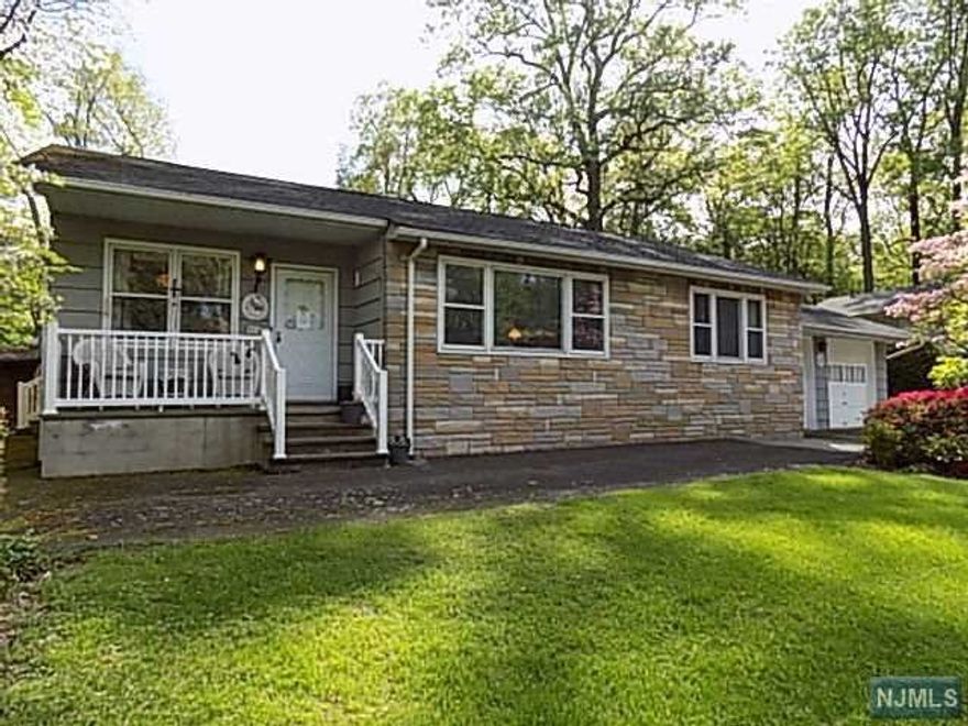 Back on the market with a BRAND NEW 2022 SEPTIC SYSTEM. Beauty surrounds this orig. 1954 lg. Ranch home. Over 1,500 sq. ft. of living space + bonus oversize 2 car garage. Spacious Living Room, Excellent size Kitchen with Knotty pine cabinets, buffet area and separate Dining Area. Family Room w/loads of windows that overlook the rear yard. Wood burning stove and dual access to the yard. Mature flowering trees with Spring Blooms just showcases the property. 3 storage sheds/barn included. Good size Master Bedroom along with 2 Bedrooms, 3rd BR currently used as the DR, Full C/T Bath all is in great condition. Wood floors too! Full lower level, a large space for a Rec Room and craft room with a little updating! Laundry, workshop area, storage and walk up to the garage. Make the move today, great place to live!