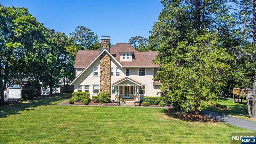 Beautifully appointed 3-Story Colonial perfectly situated to capture expansive Western views & breathtaking sunsets. Nestled on one of Caldwell's most coveted tree-lined streets,this home offers a blend of warmth & charm.Inviting front porch welcomes you into a Center hall foyer.LivingRm feat beautiful gas fireplace w/cherry wood & travertine mantle.French Doors lead to a perfect office or playRm(flexible space).Rear cathedral den overlooking yard.Formal DiningRm conveniently located off Kitchen w/honed granite center island,cherry cabinets,breakfast bar & separate eating area + 2 doors that lead outside to deck!MudRm leads to covered porch.2nd floor is home to 4 BedRms/2 full baths incl the primary BedRm w/sitting room,Jacuzzi tub + walk-in closet,a true retreat!The 3rd floor offers 2 additional BedRms,storageRm,Full bath,Cedar closet.Basement provides the perfect RecRm plus workshop + laundry area!2 Zone Central Air. Set on a large,well-maintained lot,this home is perfect for outdoor enthusiasts & those who appreciate privacy & space.The expansive backyard is ideal for hosting,gardening & more. For those w/a love for cars,a 3-car garage equipped w/electricity + loft offers plenty of room for vehicles,tools + addt'l storage,while the long driveway provides ample parking for guests.The Caldwell lifestyle features the best restaurants & pubs in Caldwell's famous downtown,top rated schools,parks, 2 town pools,NYC transportation,free summer concerts at the Gazebo & so much more!