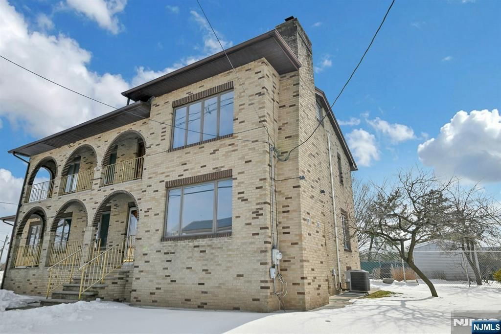 Photo of 34 Locust Street, Elmwood Park, NJ 07407 (MLS # 26002825)