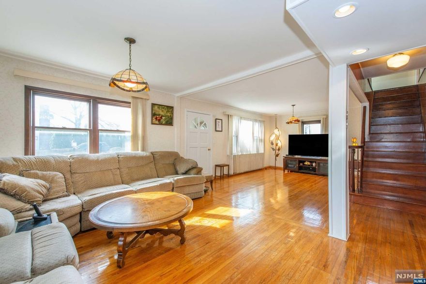 This spacious Dutch Colonial home is nestled on a quiet street in the highly desirable Milnes area of town. The house boasts beautiful hardwood floors, adding warmth and character to the living spaces. You will find a full bathroom on every floor, ensuring comfort for all family members. An exciting bonus! There is an in-law suite at the back of the house, complete with a living space, large kitchen, bedroom and full bath - perfect for extended family members or guests. Imagine the possibilities: the connecting door(currently closed) allows you to convert this suite into a huge family room or any other additional living space you desire. Finished and heated basement provides ample space for storage, hobbies, or recreation. Families will appreciate the short walking distance to both elementary and middle schools. Close proximity to bus and highways adds convenience. This house is waiting for a new family to call it home!