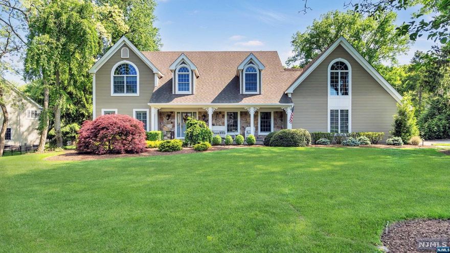 4061 SQ FT HOME (PLUS FIN BASEMENT) ON ONE OF WYCKOFF'S MOST DESIRABLE STS. IN LINCOLN SCHOOL SECTION. GRACIOUS COVERED FRONT PORCH & LG.2 STORY FOYER.LG FDR & FLR w FRRENCH DOORS TO A SPACIOUS/OPEN GREAT RM W/LG WINDOWS, LOTS OF NATURAL LIGHT,VAULTED CEILING, FLOORTO CEILING STONE GAS FPL.FRENCH DOORS FROM FAM RM & KITCHEN LEADING TO THE RESORT LIKE PAVER PATIO,GUNITE SALT WATER HEATED POOL W/SPA, WATERFALL & CUSTOM DESIGNED BAR SURROUNDED BY LUSH LIGHTED LANDSCAPING. KITCHEN w DINING AREA, SUBZERO REFRIGERATOR,WOLF DBL GAS RANGE OVEN w 6 BURNERS & GRIDDLE,OVERSIZED FARMHOUSE SINK w REVERSE OSMOSIS WATER FILTRATION & INSTANT HOT/COLD. WHOLE HOUSE WATER SOFTENER & FILTRATION SYSTEM. MUDROOM ENTRY w LAUNDRY FROM GARAGE. BACK STAIRWAY TO A MEDIA/BONUS ROOM/HOME OFFICE,PLUMBED FOR A BATH.PRIMARY BR W/HIGH CEILINGS, LG WINDOWS & AMAZING NEWLY RENOVATED BATH. GLEAMING HARDWOOD FLOORS. FIN. BASEMENT W/FR.DOORS TO A HOME GYM. ELEC.CAR CHARGING STATION.CENTRAL ALARM SYSTEM. STORAGE GALORE